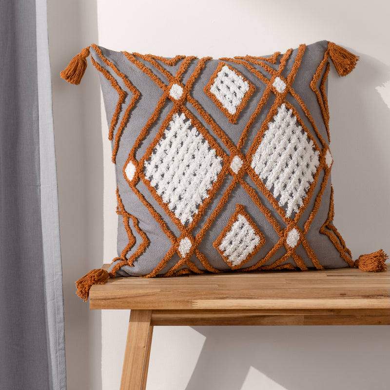 furn. Aquene Tufted Tasselled Cushion Cover in Charcoal/Brick