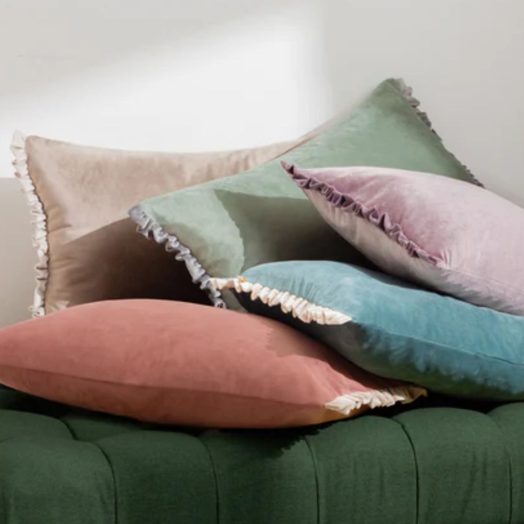wholesale home furnishings pile of cushions